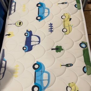 Toddler bed and mattress.